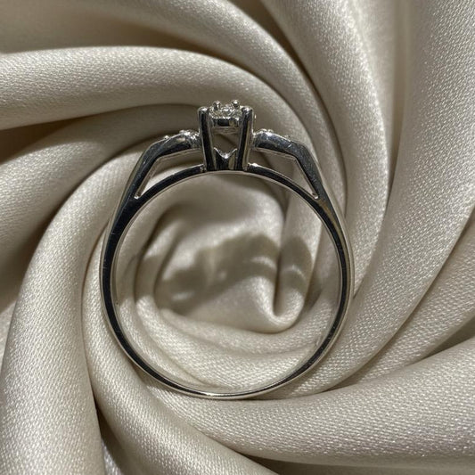 10K gold diamond ring detail showing expert setting delicate diamond brilliance