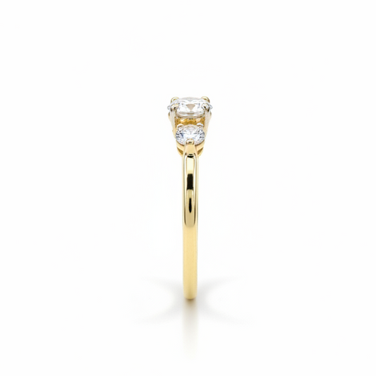 10K gold moissanite ring side view showing center stone and accent stones expert craftsmanship