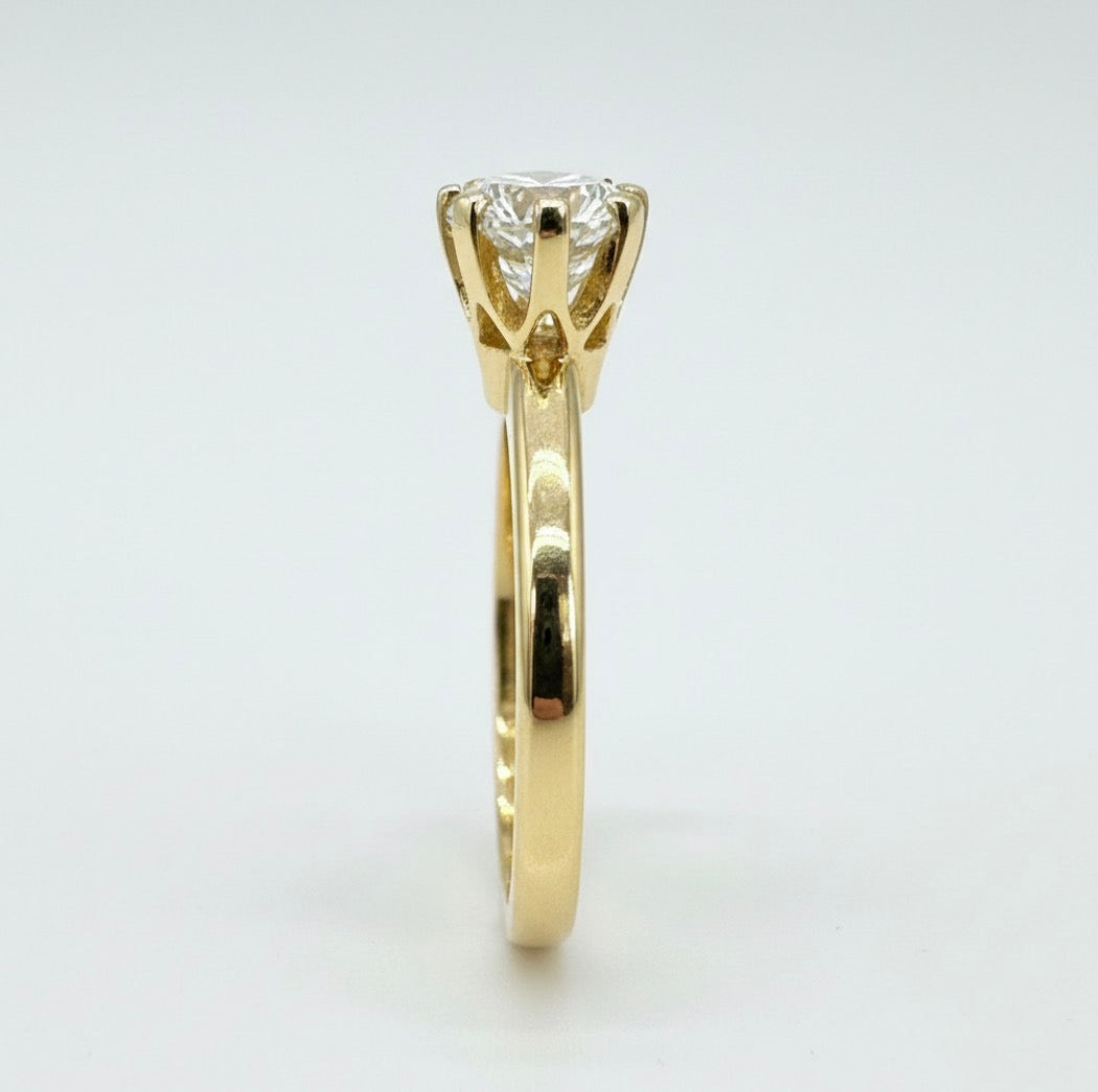 10K gold moissanite ring side view showing setting luxurious finish