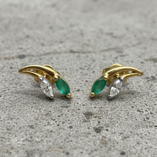 18K gold emerald leaf drop earrings botanical design vivid green emerald luxury