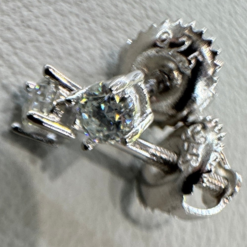 3mm moissanite studs detail showing brilliant fire sterling silver rhodium plated luxurious finish