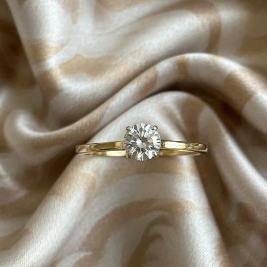 10K gold moissanite ring detail showing circular moissanite sparkle expert craftsmanship
