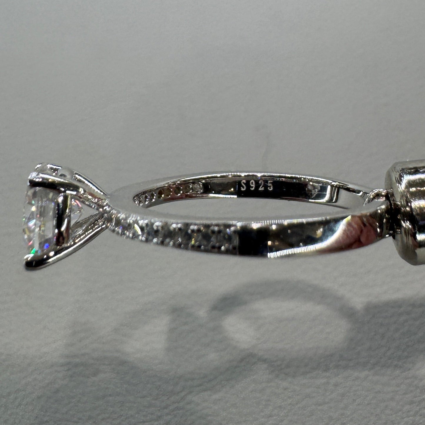 Sterling silver moissanite ring AZ014-J close-up showing brilliant stone and expert setting
