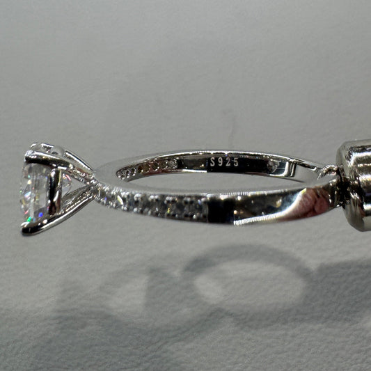 Sterling silver moissanite ring AZ014-J close-up showing brilliant stone and expert setting