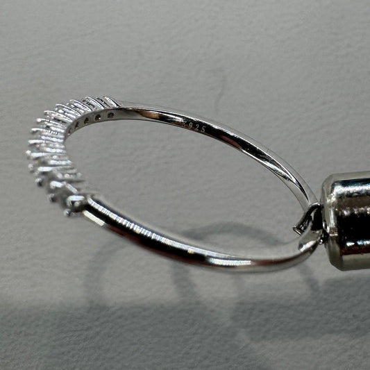 Sterling silver moissanite ring AZ064-J close-up showing brilliant stone and expert setting