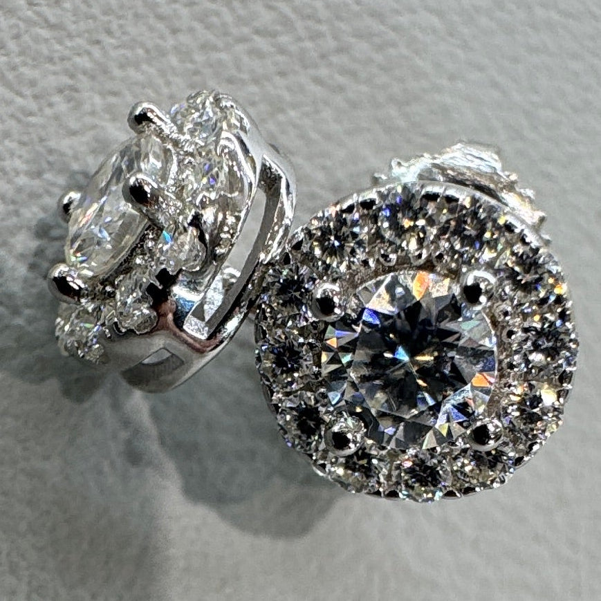Moissanite studs detail showing accent stones halo design sterling silver rhodium plated luxurious finish