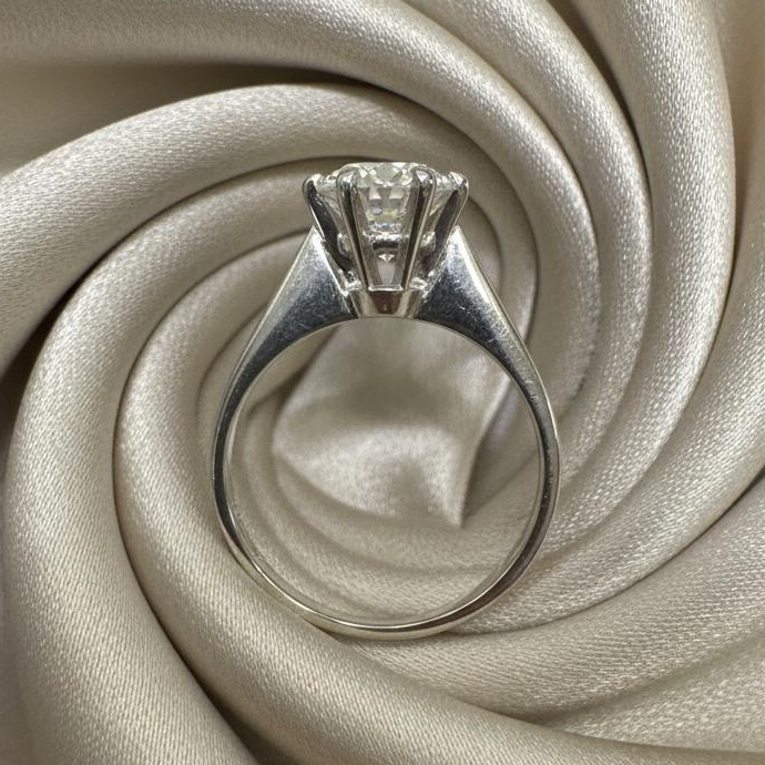 Platinum diamond ring detail showing expert setting natural diamond brilliance