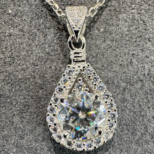 Sterling silver pear-shaped pendant detail showing 1ct moissanite stone brilliant fire and sparkle