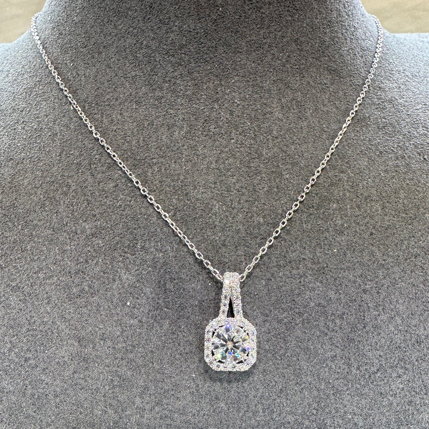 Sterling silver square pendant detail showing 1ct moissanite stone brilliant fire and sparkle