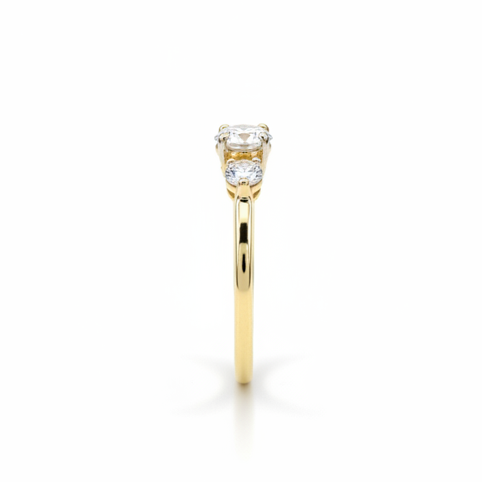 10K gold moissanite ring side view showing center stone and accent stones expert craftsmanship
