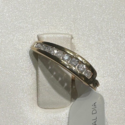 Piercing para ombligo de oro de 14 quilates. Adornado con 25 brillantes diamantes.