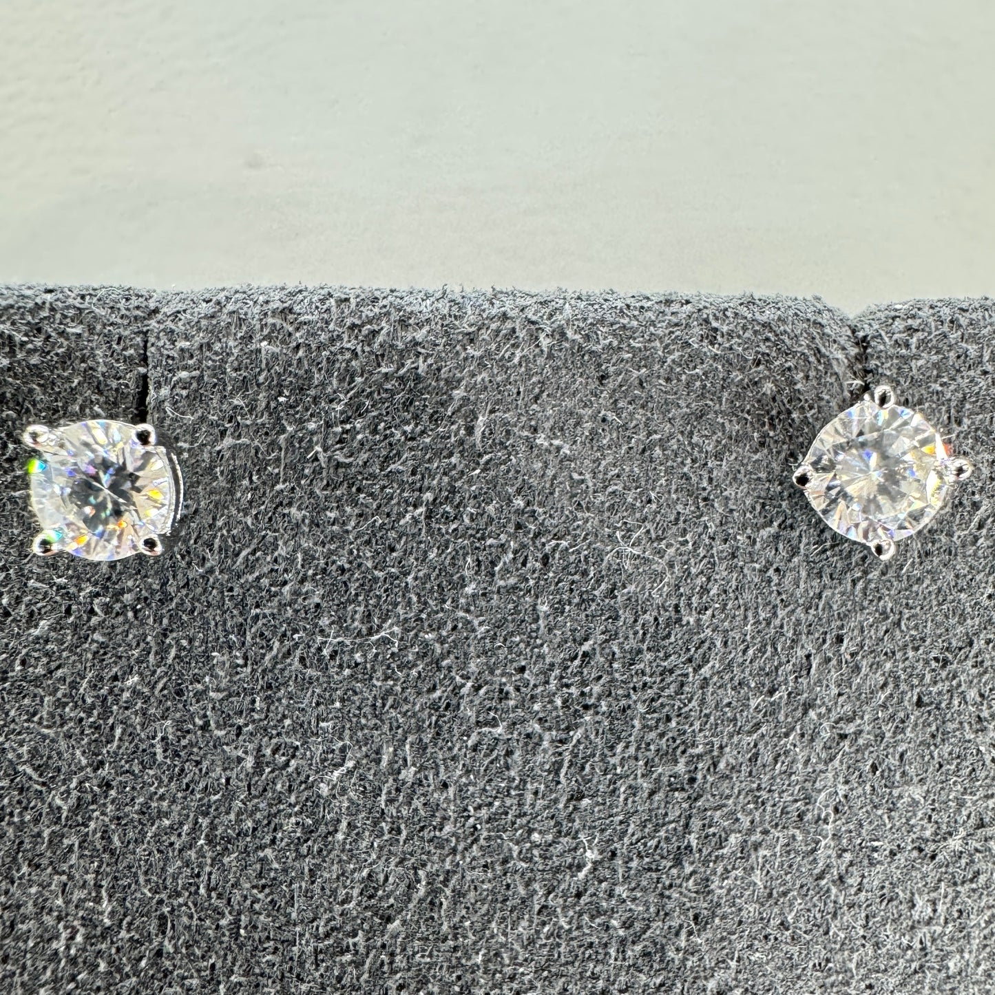 4mm moissanite stud earrings sterling silver rhodium plated brilliant sparkle delicate everyday elegance
