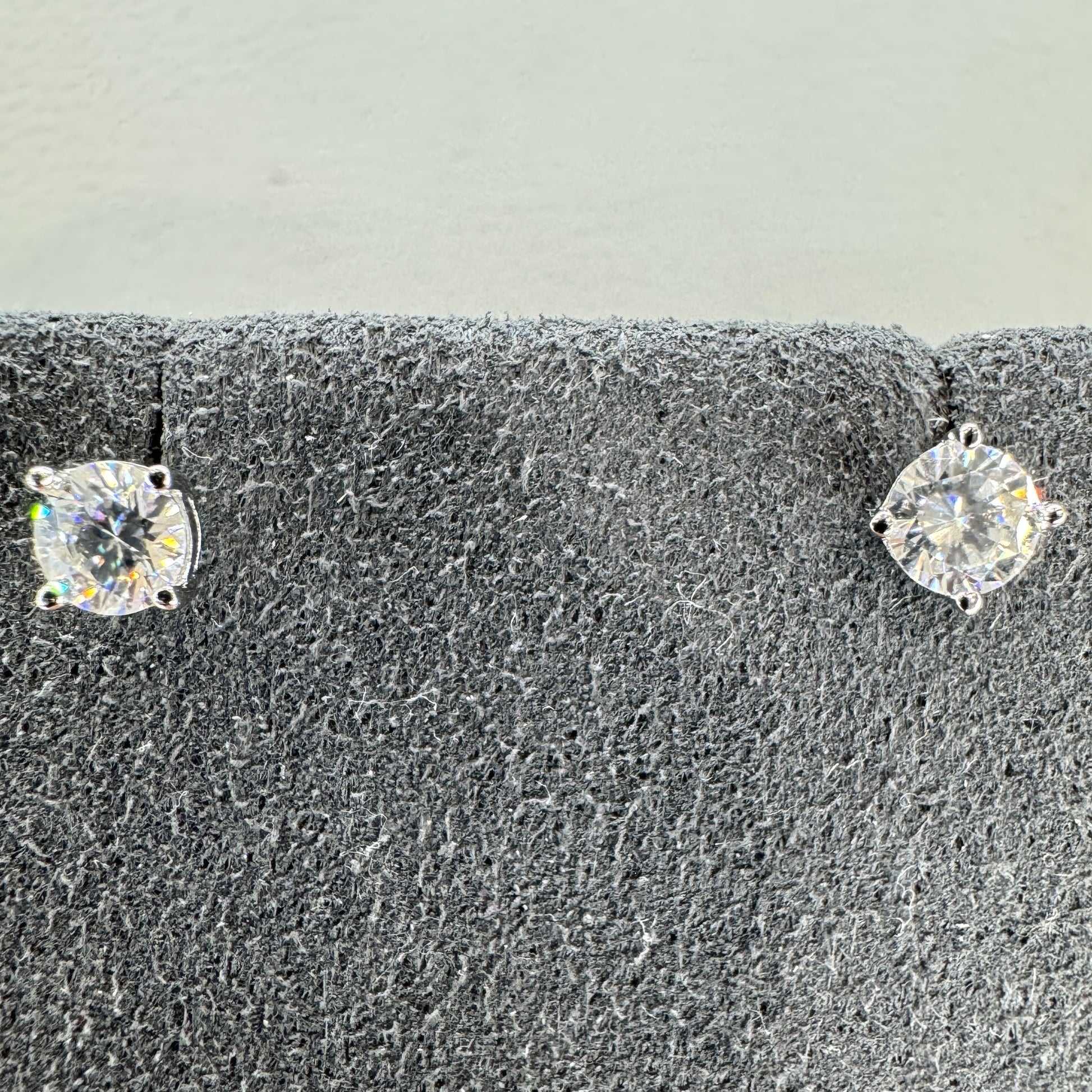 4mm moissanite stud earrings sterling silver rhodium plated brilliant sparkle delicate everyday elegance
