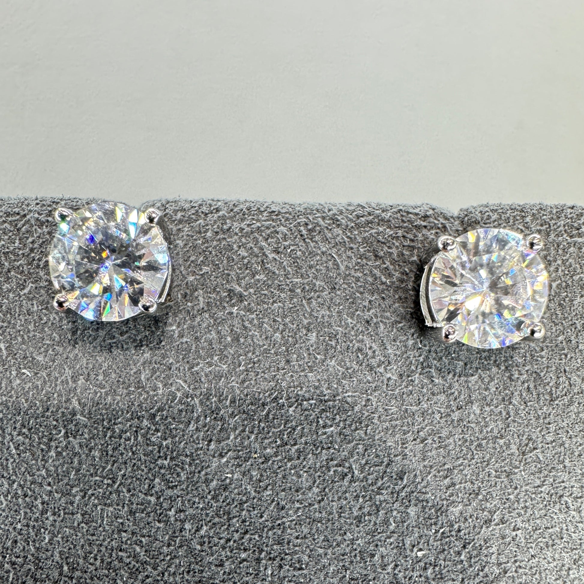 6.5mm moissanite stud earrings sterling silver rhodium plated brilliant sparkle 1 carat equivalent
