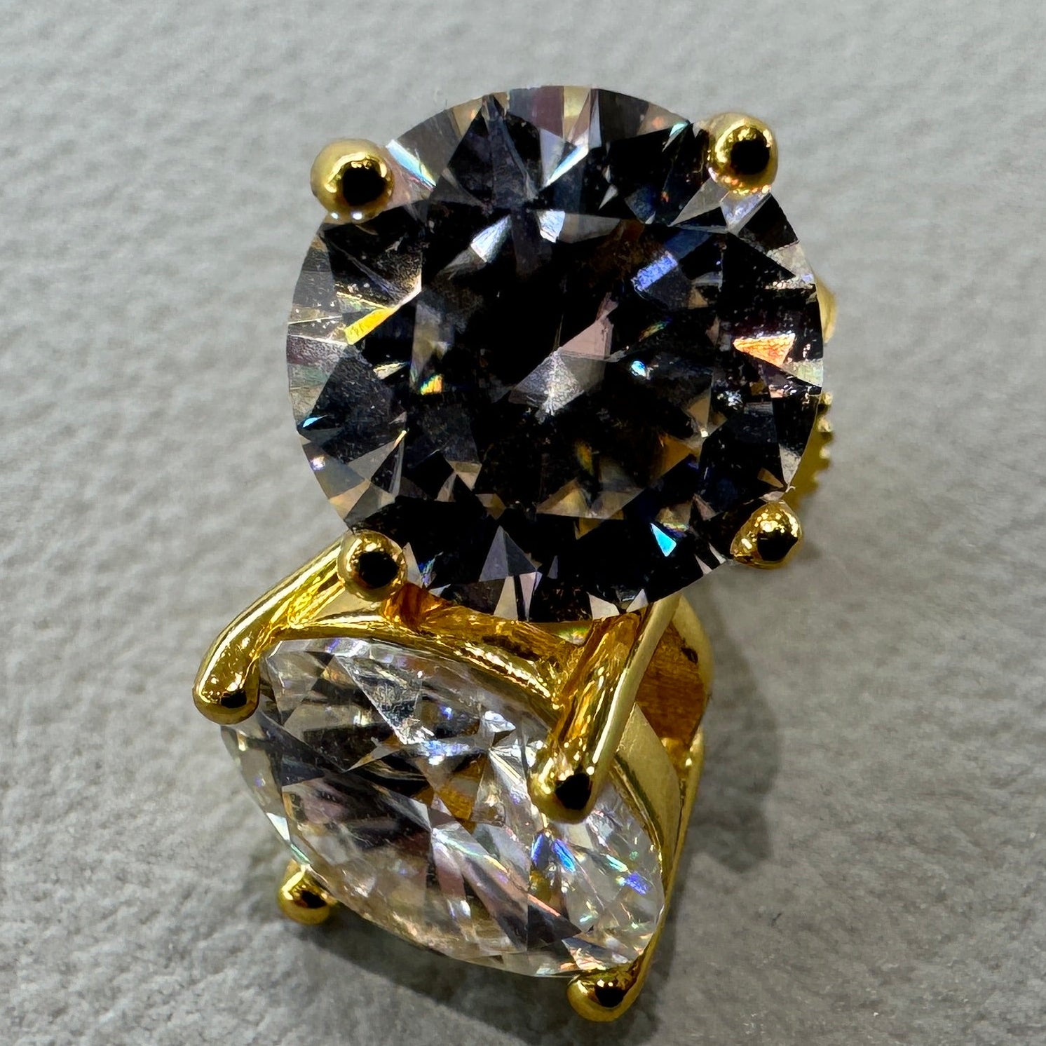 8mm moissanite studs detail showing brilliant fire sterling silver gold overlay luxurious finish
