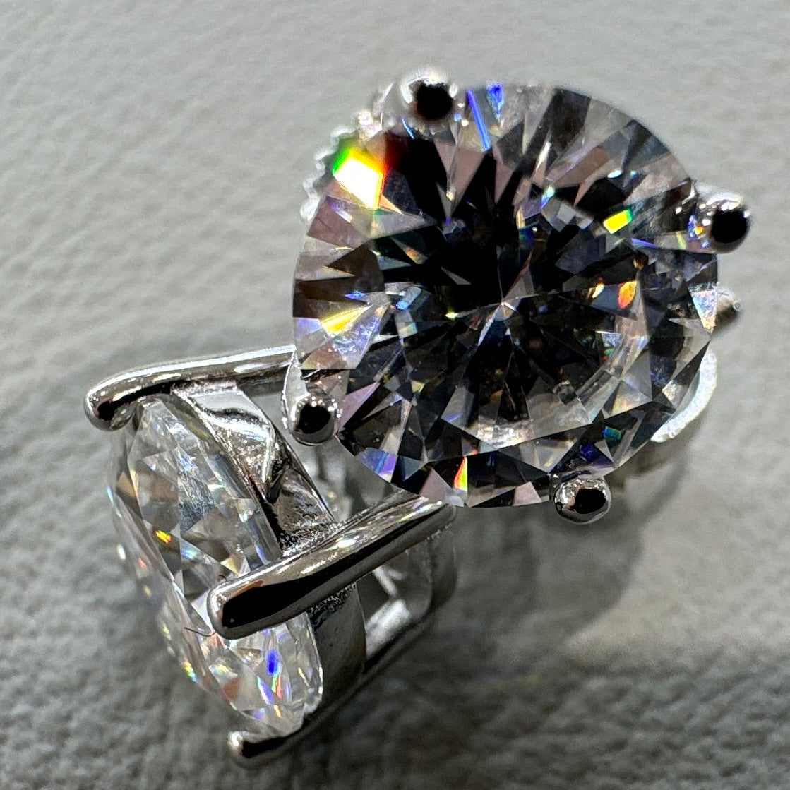 8mm moissanite studs detail showing brilliant fire sterling silver rhodium plated luxurious finish
