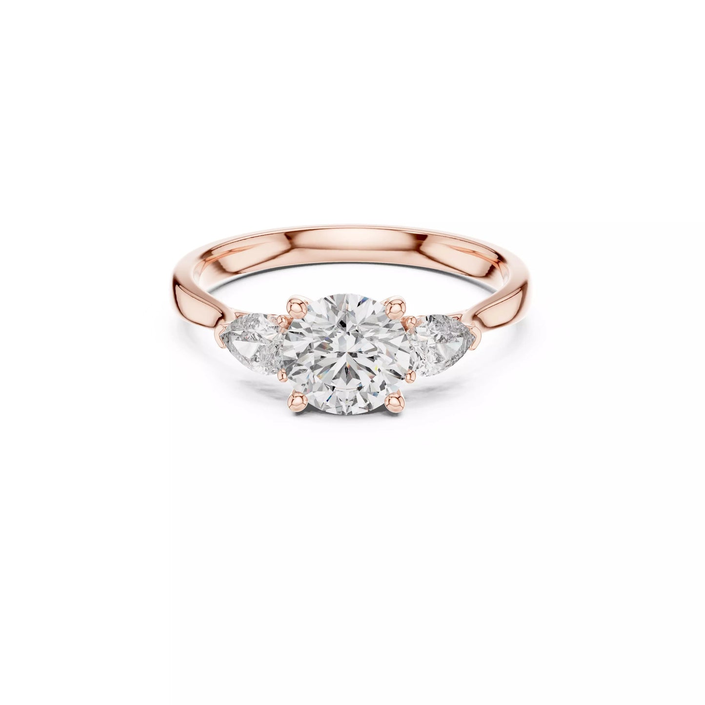 Round Three-Stone Engagement Ring with Pear Sides