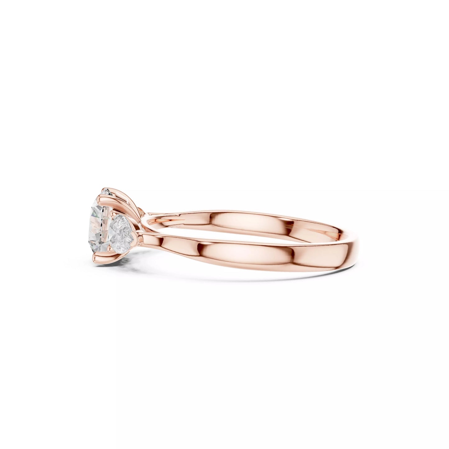 Round Three-Stone Engagement Ring with Pear Sides