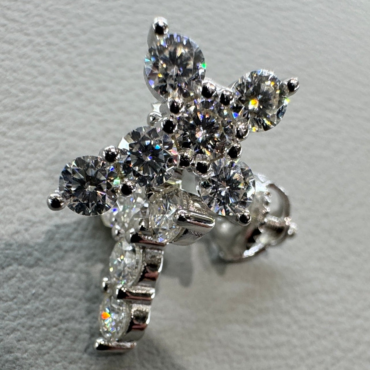 Cross earrings detail showing moissanite stones sterling silver rhodium plated elegant
