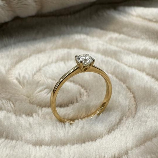 10K gold moissanite ring side view showing center stone setting luxurious finish
