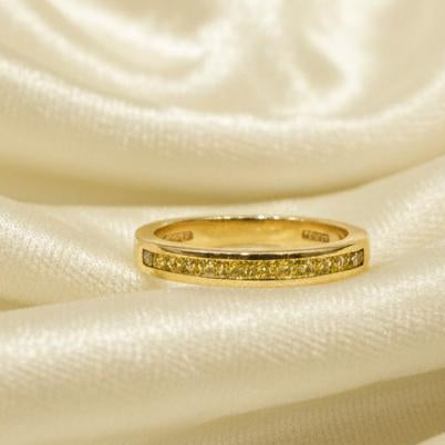 14K gold yellow diamond ring detail showing yellow diamond brilliance expert craftsmanship
