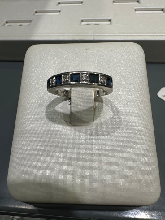 Bague en Or 10K con .04CT de diamantes + .50CT de zafiro