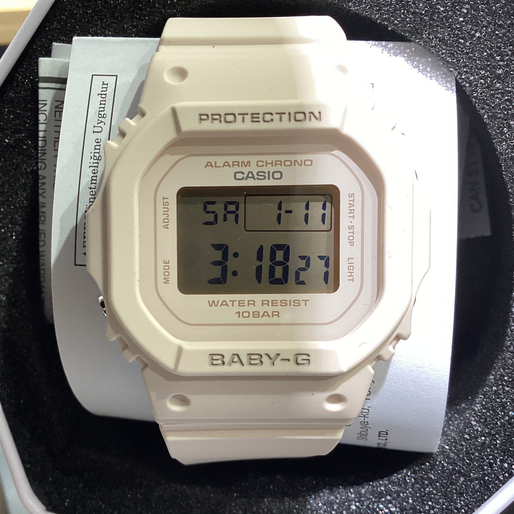 Casio Baby-G BGD-565-4CR women's watch showing digital display and pink design