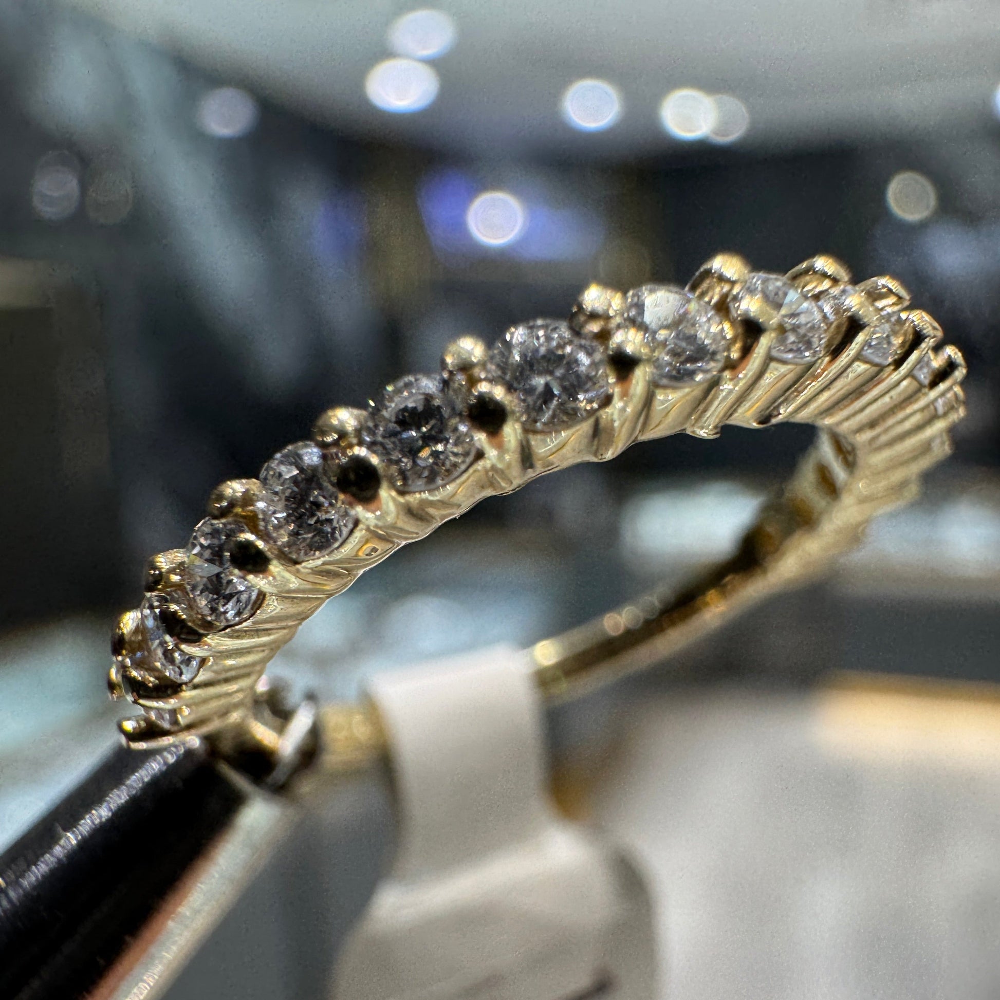 10K gold semi-eternity ring detail showing diamond sparkle, free professional sizing