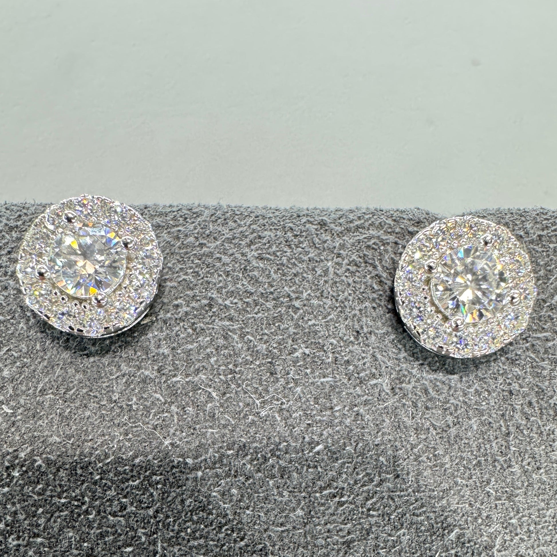 Moissanite stud earrings with accent stones sterling silver rhodium plated brilliant sparkle halo effect
