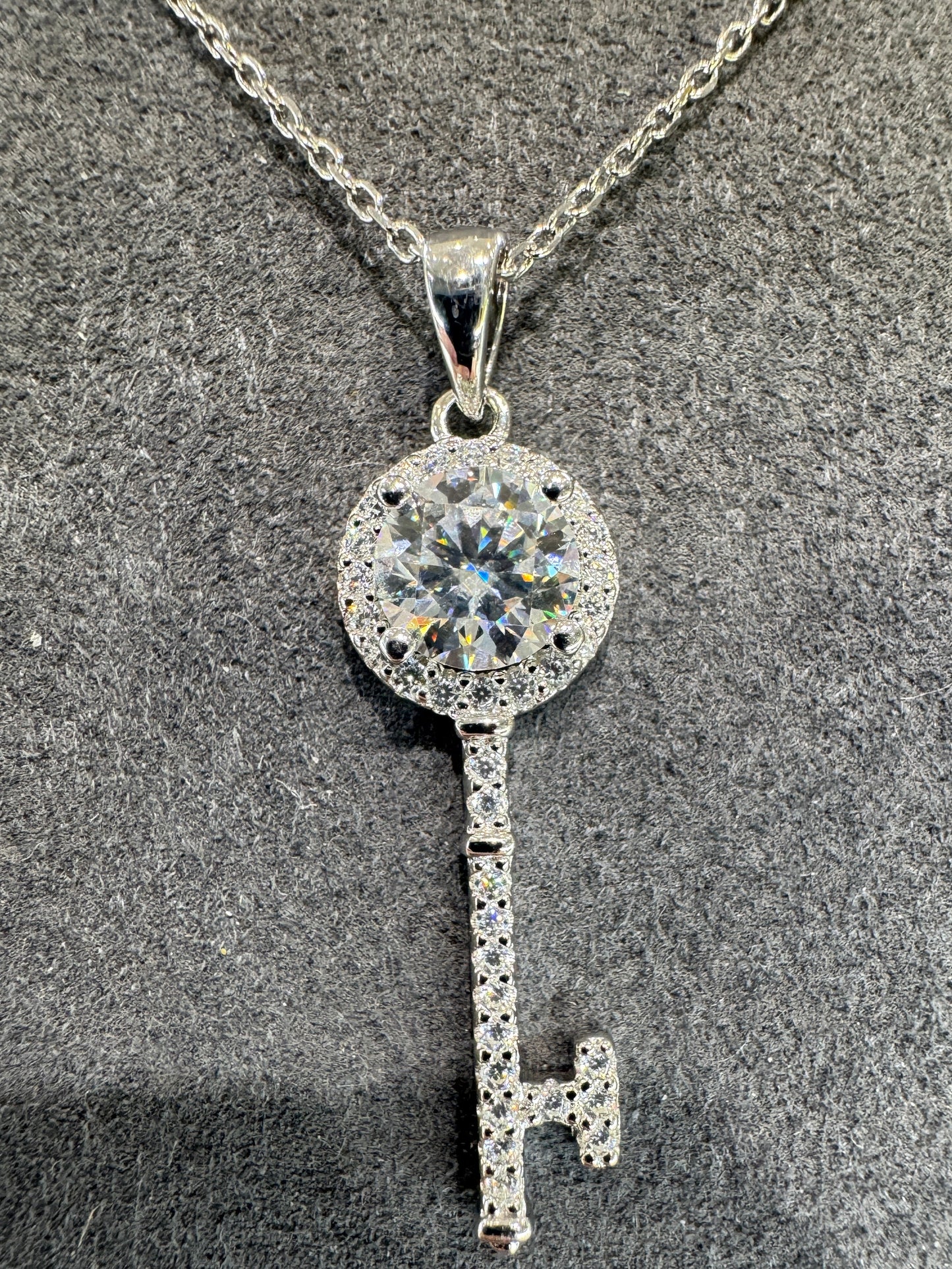 Sterling silver necklace with key pendant and 1ct moissanite Model MJE1101 symbolic elegant design
