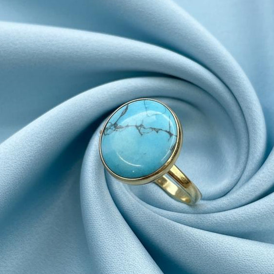 14K gold turquoise ring natural center stone distinctive blue beauty timeless elegance
